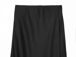 Detailed close-up of the smooth waistband and satin fabric on this black midi skirt