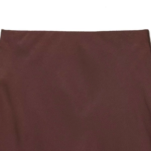 Gonna asimmetrica in pizzo bordeaux caratterizzata da tessuto intrecciato ad alta densità
