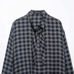 Green and black plaid scarf collar shirt with a long tie neck and button front