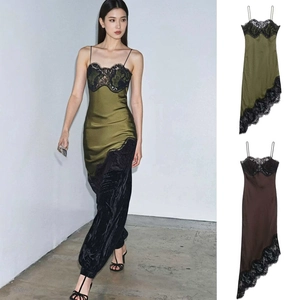 Close-up of elegant floral lace trim and smooth satin finish on asymmetrical maxi dress