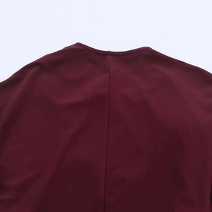 Detail of the high-quality stitching on back neckline of wine red minimalist dress