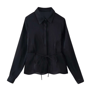 Elegant black long sleeve blouse with shiny finish and waist drawstring detailing