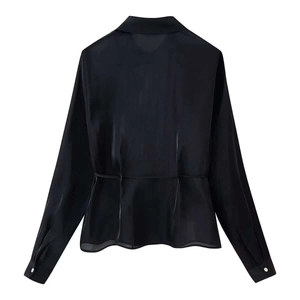Back view of black long sleeve shirt featuring a cinched waist and silky texture detail