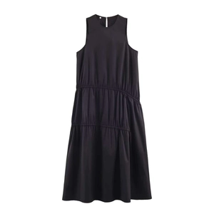 Minimalist black sleeveless midi dress with tiered ruffle details and a round neckline