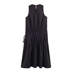 Detail view of black sleeveless midi dress with halter neck and side drawstring ties