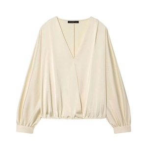 Elegant ivory wrap blouse with deep V-neck, lantern sleeves, and satin finish for women