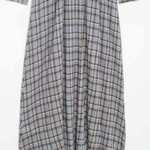 Light gray plaid shirt dress with vintage checkered pattern and soft cotton texture