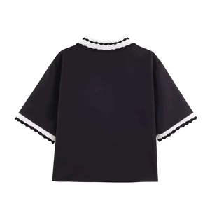 Back view of a black short-sleeve polo shirt with striped wave-edged trim and a loose fit