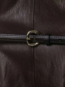 Close-up of dark brown leather texture with a fine black belt and gold oval buckle detail
