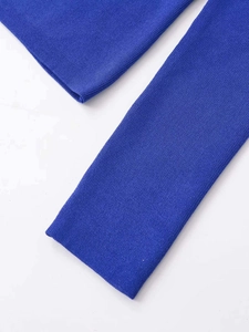 Detailed close-up of blue ribbed knit texture and premium stitching on the garment cuff