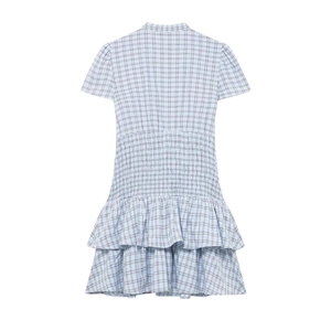 Back view of light blue plaid short sleeve dress with smocked waist and tiered skirt