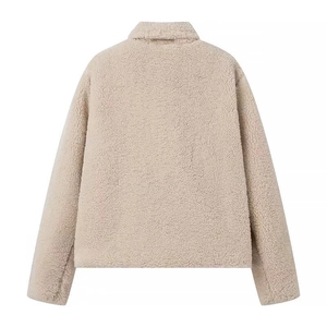 Beige faux fur teddy coat with a textured finish and stylish lapels in back view