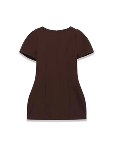 Detail view of a chocolate brown mini dress showing the back invisible zipper and seams