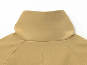 Close-up of khaki twill jacket collar and shoulder with double stitching detail