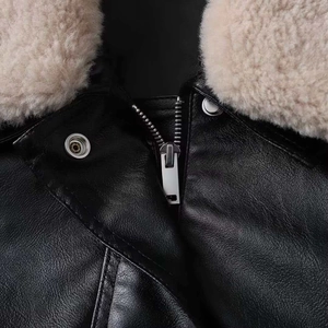 Chic black leather jacket with beige faux shearling collar and silver zipper detail