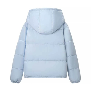 Rear view of a light blue quilted winter jacket with a removable hood and windproof fabric