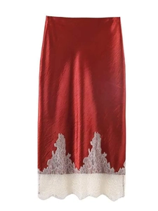 Detailed view of dark red satin midi skirt featuring delicate white lace hem trim