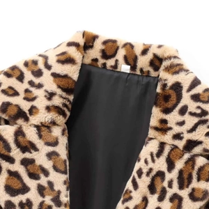 Faux fur leopard print coat featuring a plush texture and smooth black inner lining