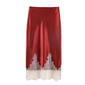 Elegant midi satin skirt in deep red with white lace trim detail on the hemline