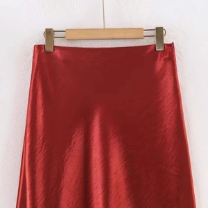 Elegant deep red satin midi skirt with silky glossy finish and minimalist waist design