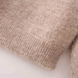Vintage khaki rhombus knit sweater with soft brushed wool texture and ribbed cuffs