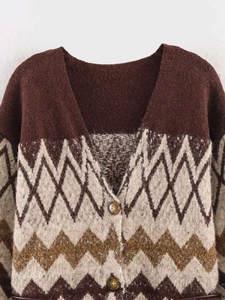 Detailed view of women's vintage jacquard knit cardigan with geometric diamond patterns