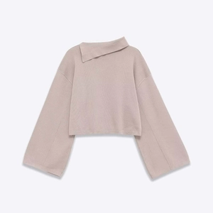 Women's dusty pink knit top with asymmetric fold-over neckline and stylish wide sleeves