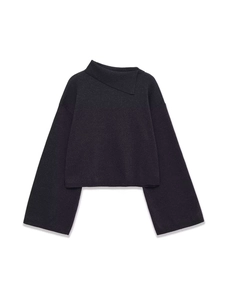 Detail view of charcoal gray knit sweater with asymmetric neck and wide flare sleeves