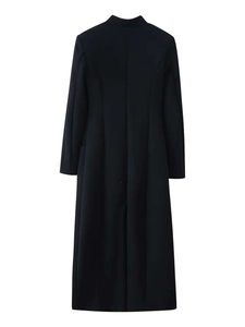 Rear view of sleek black wool coat featuring a slim fit cut and elegant stand collar