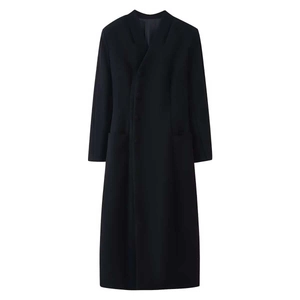 Flat lay of black wool coat featuring stand collar and side buttons with slim waist cut