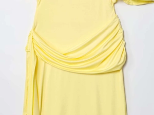 Detail shot of pale yellow backless maxi dress with draped layered fabric detail