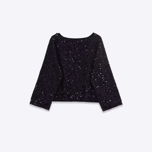 Giacca chic con paillettes nere, maniche lunghe, girocollo e taglio corto morbido