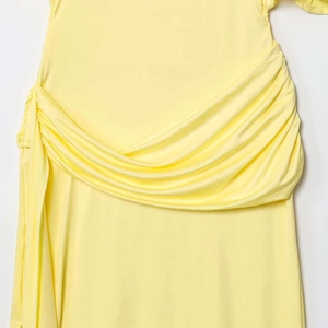 Elegant lemon yellow backless tiered maxi dress with draped detailing in soft fabric