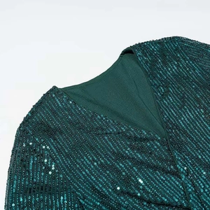 Sparkly dark green sequined V-neck maxi dress with long sleeves and front slit detail