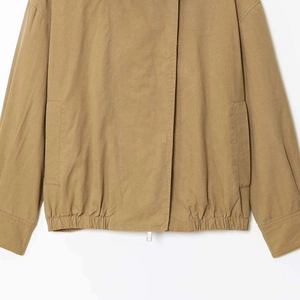Khaki aviator jacket with faux fur collar, elastic hem, and zipper closure on white background