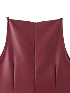 Detail view of burgundy leather dress back featuring a hidden zipper and fine stitching