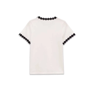 Short sleeve knit top with black floral lace collar and cuffs on white cotton back
