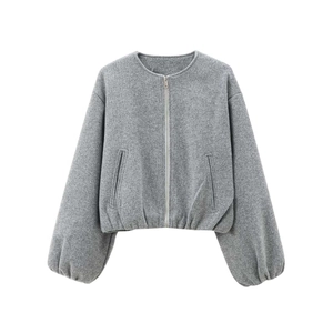 Detail of grey wool-like bomber jacket featuring metal zipper and drop shoulder design