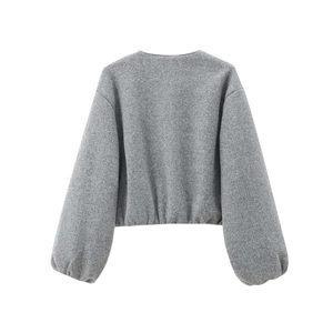 Detailed back view of grey bomber jacket showing textured fabric and elastic cuffs