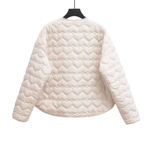 Women's cream quilted jacket featuring heart patterns and collarless round neck design