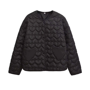 Women's black quilted jacket featuring unique heart-shaped patterns and front pockets