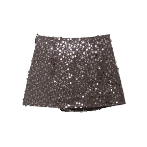 Detailed close-up showing the silver sequins and wavy patterns on this mini skirt