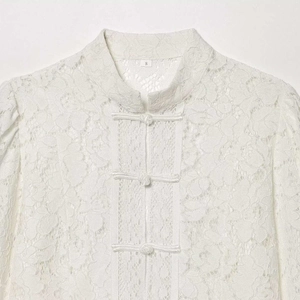 Elegant white lace shirt with stand collar and traditional Chinese frog buttons