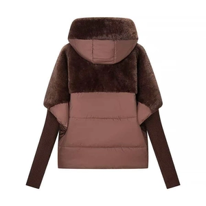 Detailed back view of women's brown hooded winter coat with faux fur and quilted patchwork
