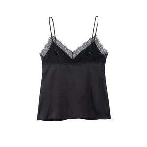 Close-up of black satin camisole featuring delicate eyelash lace trim and V-neckline