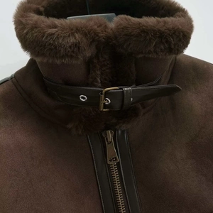 Vintage dark brown shearling jacket with warm fur collar and metallic zipper for winter