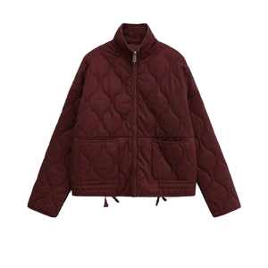 Deep red quilted puffer jacket with stand collar and functional drawcord hem
