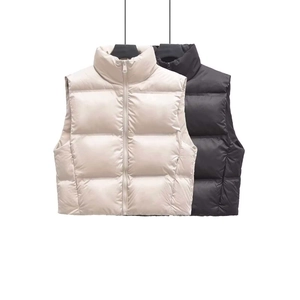 Gilet Matelassé Rembourré pour Femme Col Montant Veste Sans Manches Avec Poches Hiver Chaud Léger Décontracté Vêtement Extérieur