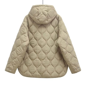 Back view of a khaki quilted hooded jacket with wave stitching and curved hem