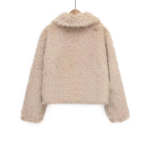 Short faux fur jacket in apricot with back view and plush texture on a wooden hanger